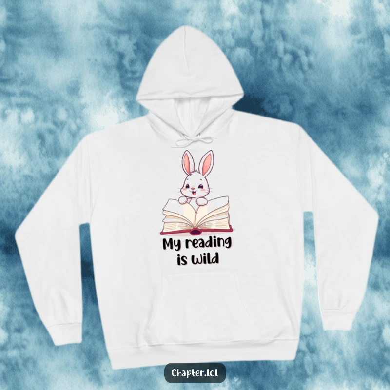 Funny hoodie featuring an energetic bunny enthusiastically turning the pages of a massive book, perfect for cozy reading adventures.