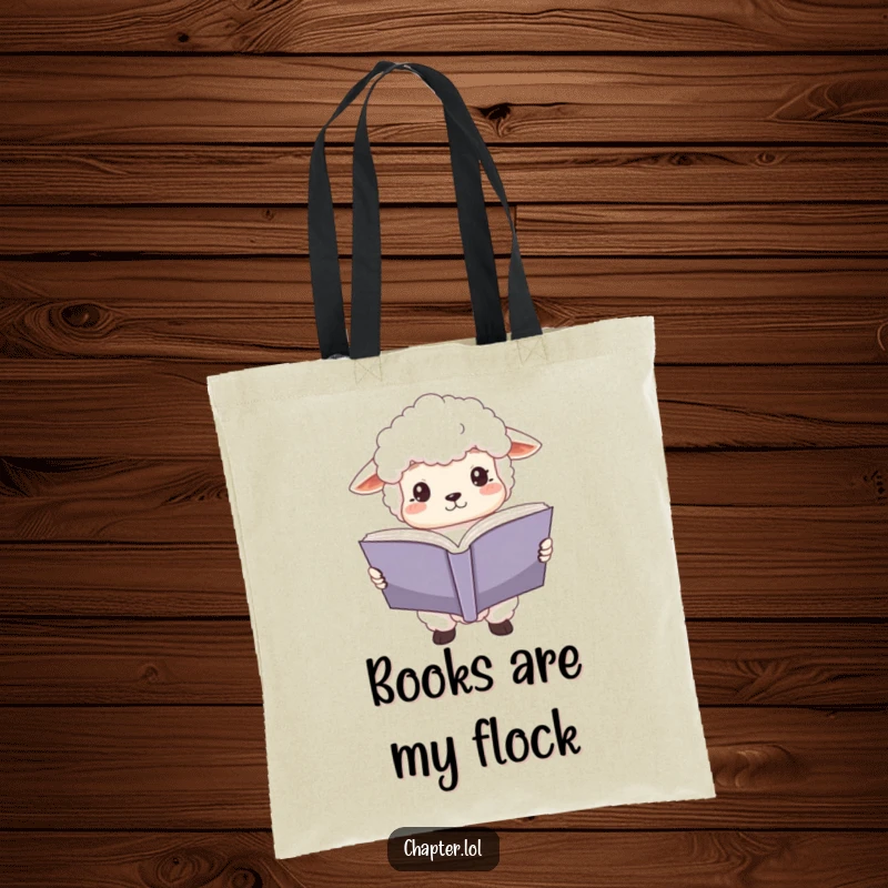 Funny sheep reader tote bag showing a fluffy white sheep holding a large open book, eyes wide with focus. Practical and humorous for book lovers.